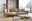 StepOne Ecksofa NEWPORT Moderne Rundecke mit grauem Stoffbezug und gelben Kissen, seitliche Perspektive
