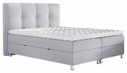 Graues Boxbett mit gestepptem Kopfteil und Matratze, seitliche Perspektive