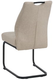 Rückansicht eines beigen Schwingstuhls mit schwarzem Metallgestell und Griff an der Rückenlehne.