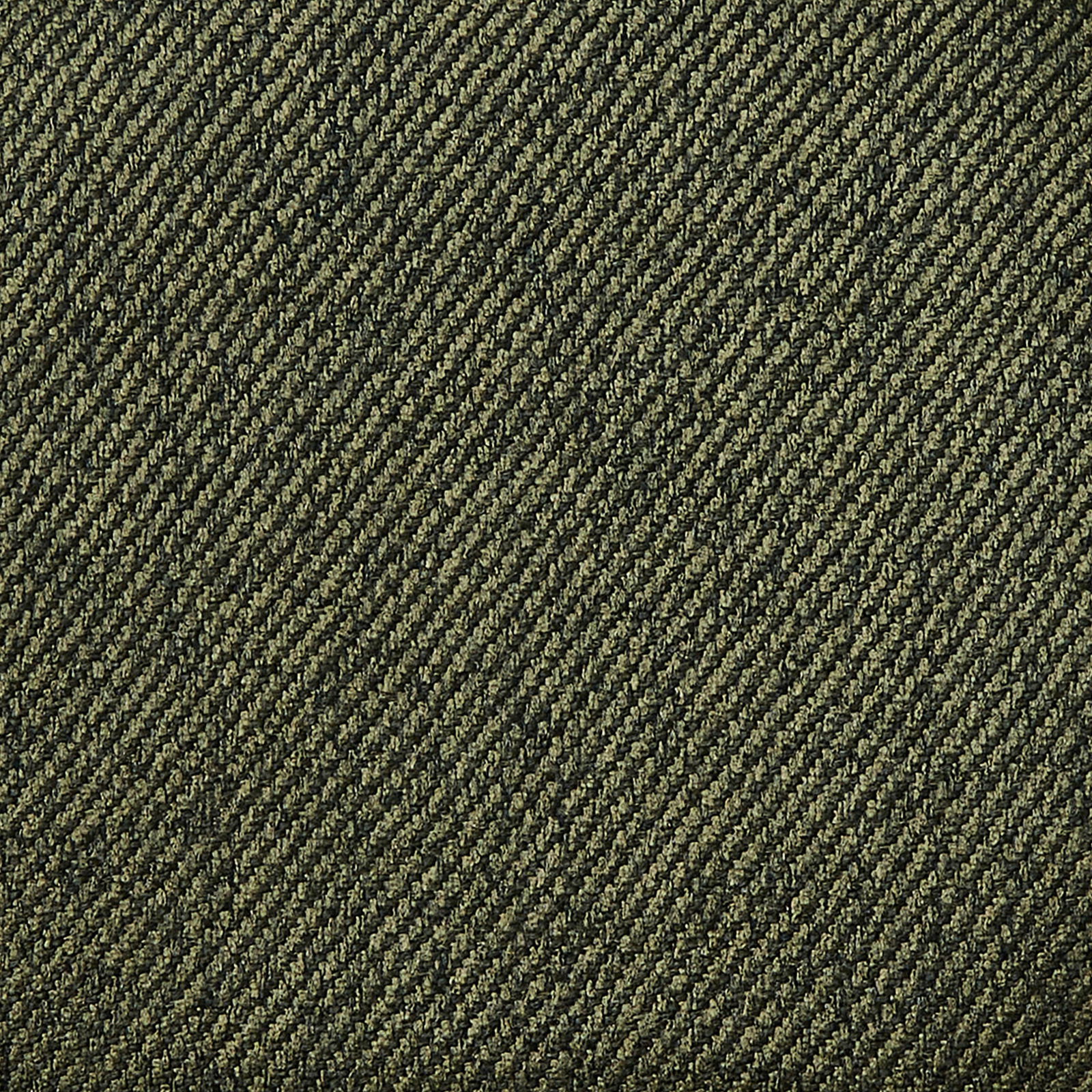 Nahaufnahme eines grünen Stoffmusters mit diagonalen Linien.