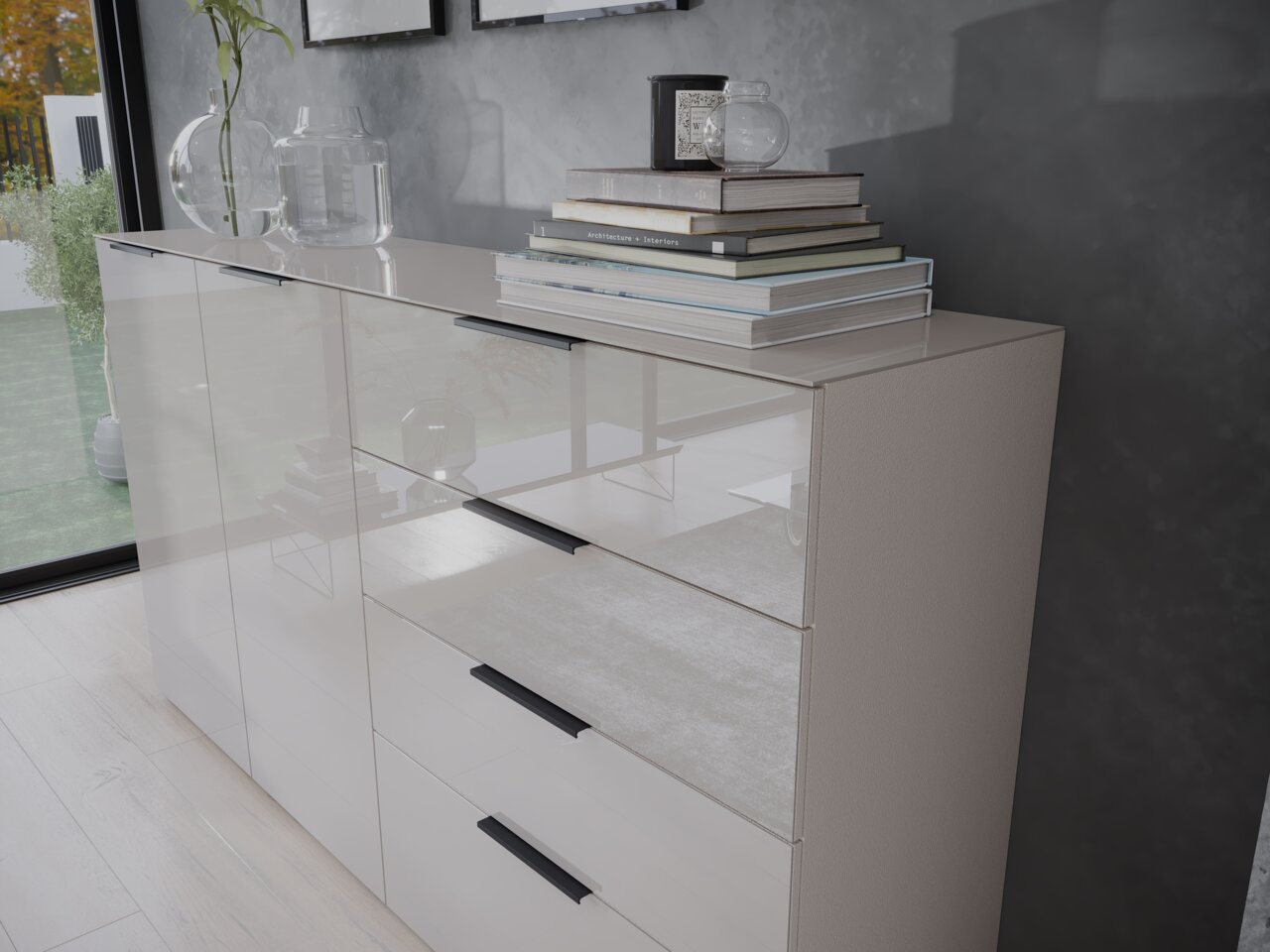 Moderne Kommode mit Hochglanzoberfläche, seitliche Perspektive, dekoriert mit Büchern und Glasvasen.