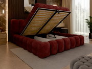 Gestoffeerd bedframe in rood met opklapbare matrasbeschermer, zijaanzicht