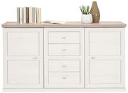 Weißes Sideboard mit vier Schubladen und zwei Türen, dekoriert mit Büchern, einer Pflanze und einer Vase, aus frontaler Perspektive.