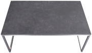 Moderner Couchtisch mit dunkler Tischplatte und Metallgestell, Ansicht von oben.