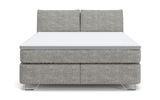 Frontale Ansicht eines grauen Boxspringbetts mit zwei Kopfstützen und Metallfüßen.