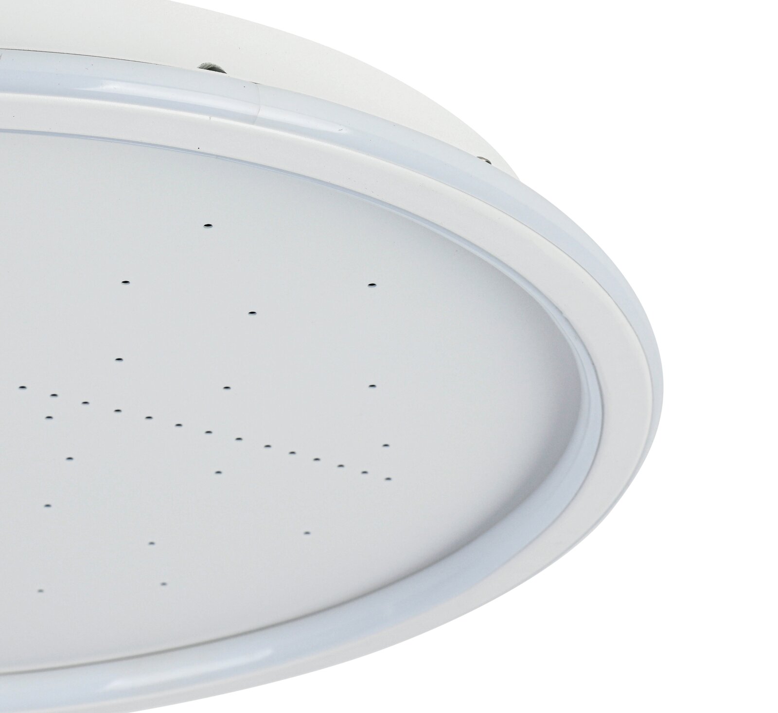 Close-up van een ronde led-plafondlamp met een wit frame en kleine gaatjes in het oppervlak, gezien vanaf de zijkant