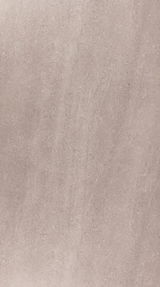 Nahaufnahme einer Tischplatte mit natürlicher Steinoptik in neutralem Beige-Ton, von oben betrachtet.