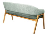Rückansicht einer modernen Sitzbank mit Holzgestell und gepolsterter Rückenlehne in grünem Stoff.