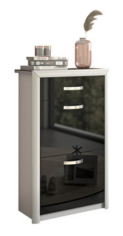 Moderner Schuhschrank mit glänzender schwarzer Front, drei Schubladen und dekorativen Gegenständen auf der Oberseite, seitliche Perspektive.