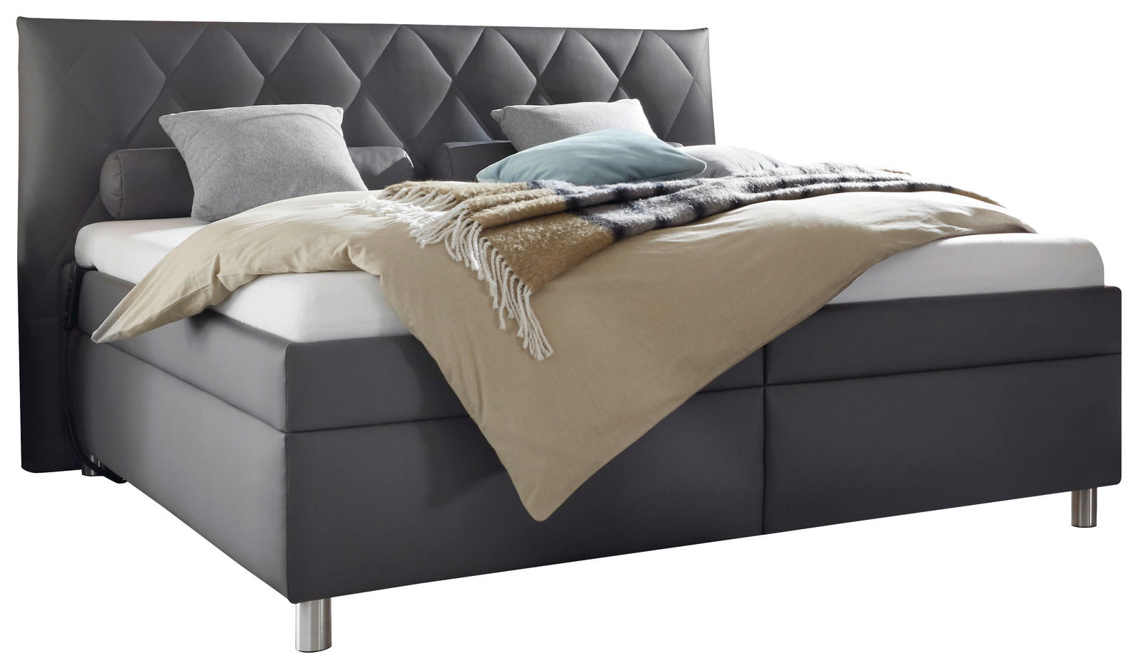 Polsterbett in seitlicher Perspektive mit grauem Kopfteil und Bettwäsche in neutralen Tönen