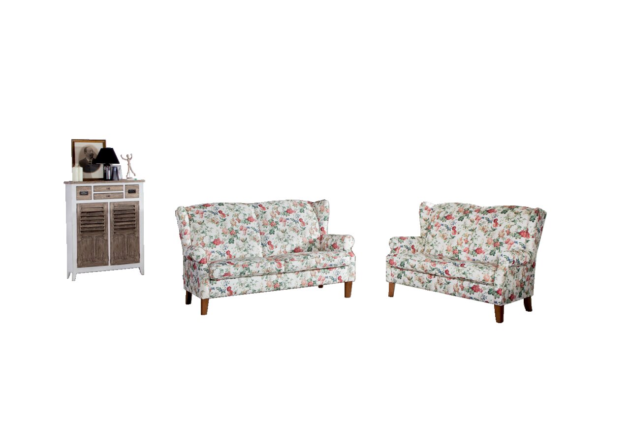 Zwei Sofabänke der Serie KIMBERLY mit floralem Muster in einem hellen Raum, seitliche Perspektive.