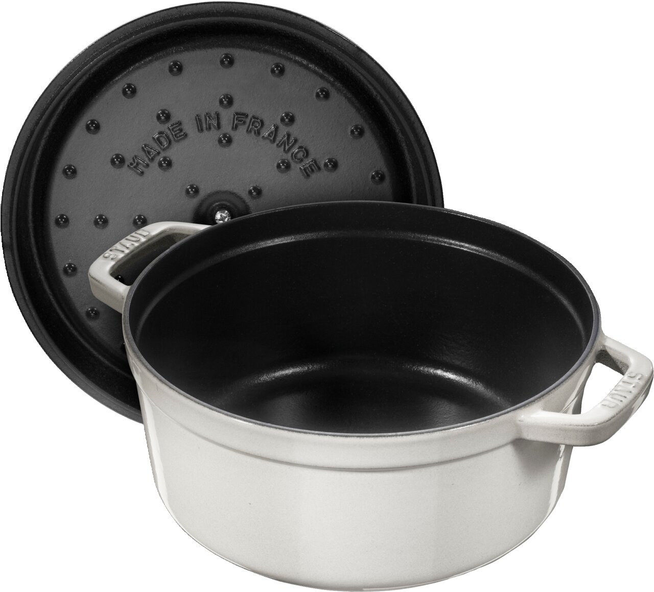 Runder Bräter Cocotte 24cm in Cremeweiß, geöffnet mit sichtbarem Deckel, Perspektive von schräg oben