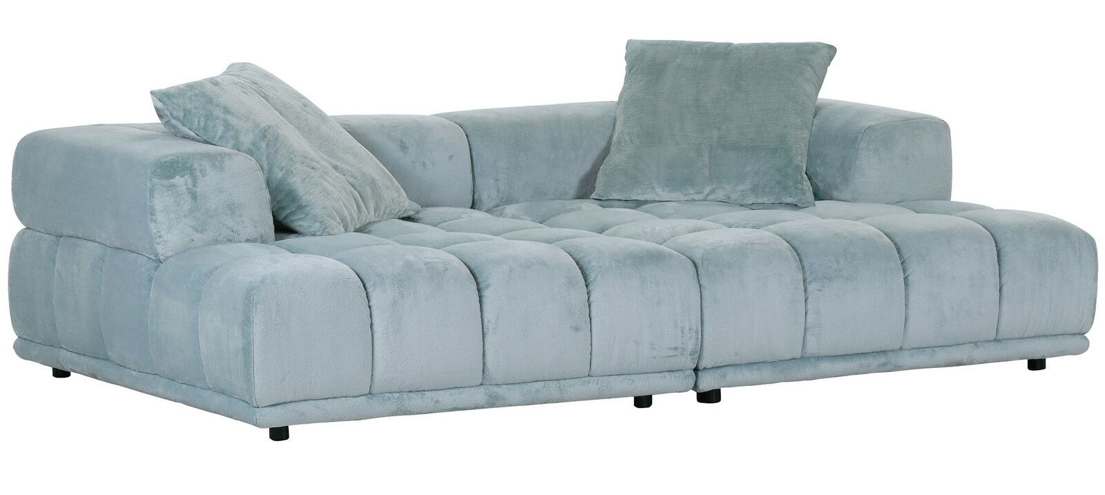 Großes, modernes Big-Sofa in hellblauem Stoff mit zwei passenden Kissen, seitliche Perspektive.