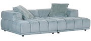 Großes, modernes Big-Sofa in hellblauem Stoff mit zwei passenden Kissen, seitliche Perspektive.