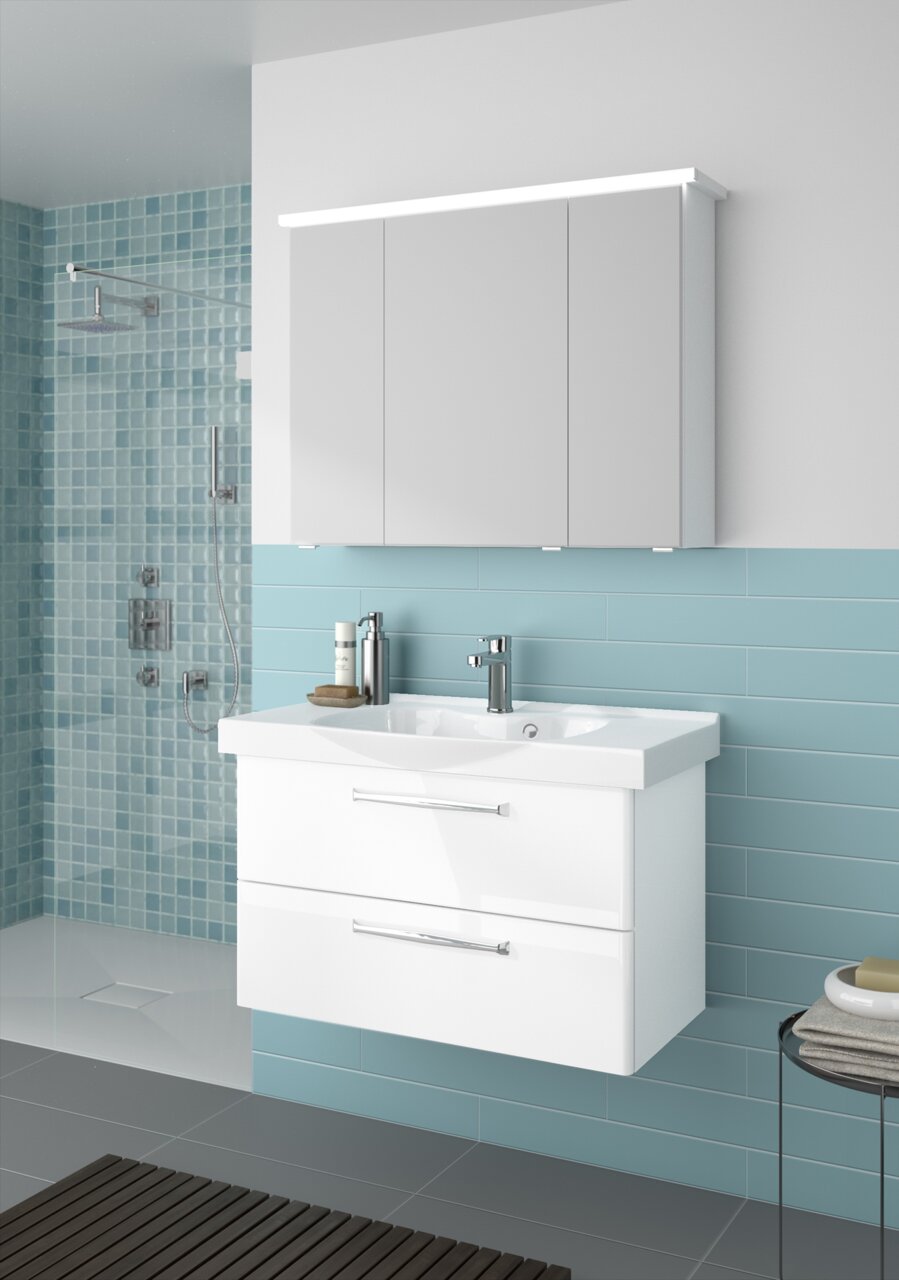 Pelipal Badblock 92cm TRENTINO Moderner Badblock mit weißem Waschbecken und Unterschrank, frontal betrachtet, vor einer türkisfarbenen Wand.