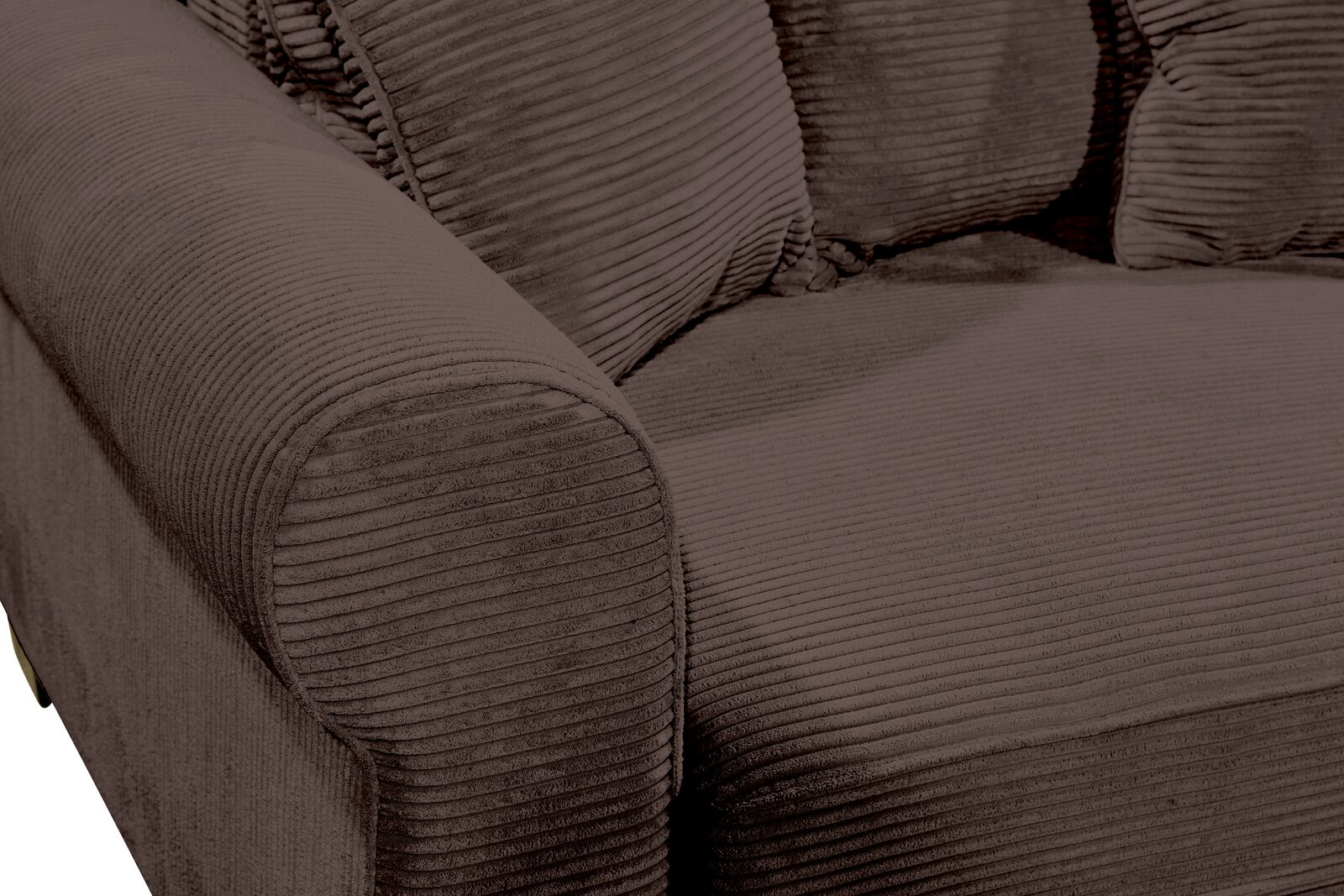 Nahaufnahme einer braunen, gerippten Sofaecke mit Armlehne und Kissen, von schräg oben betrachtet.