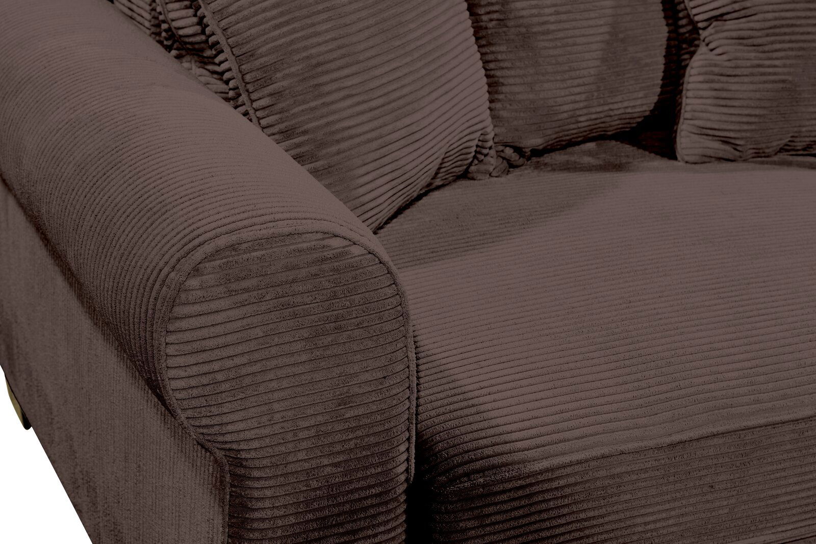 Nahaufnahme einer braunen, gerippten Sofaecke mit Armlehne und Kissen, von schräg oben betrachtet.