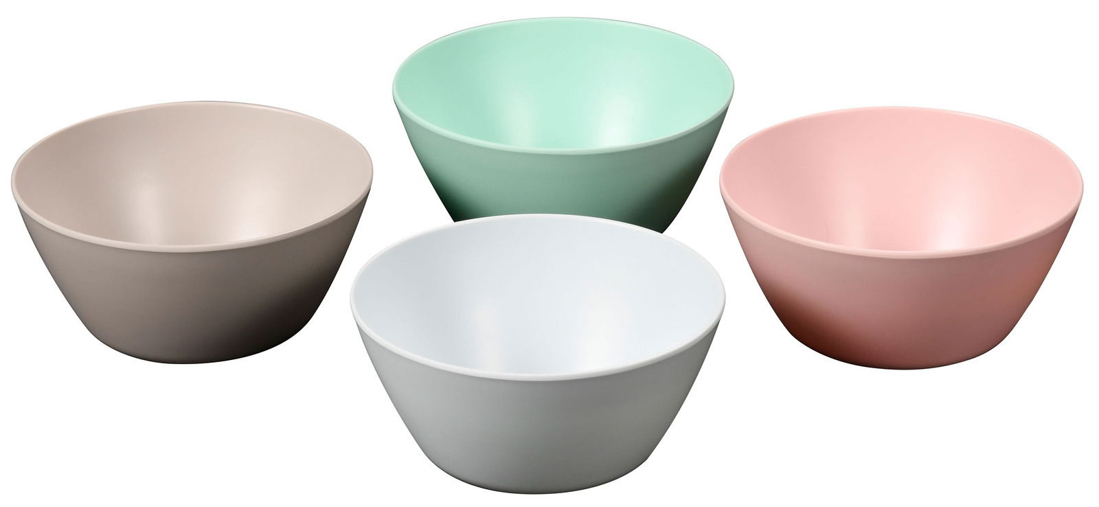 Vier bunte Obst- und Salatschalen in Pastellfarben, aus einer leicht erhöhten Perspektive fotografiert.