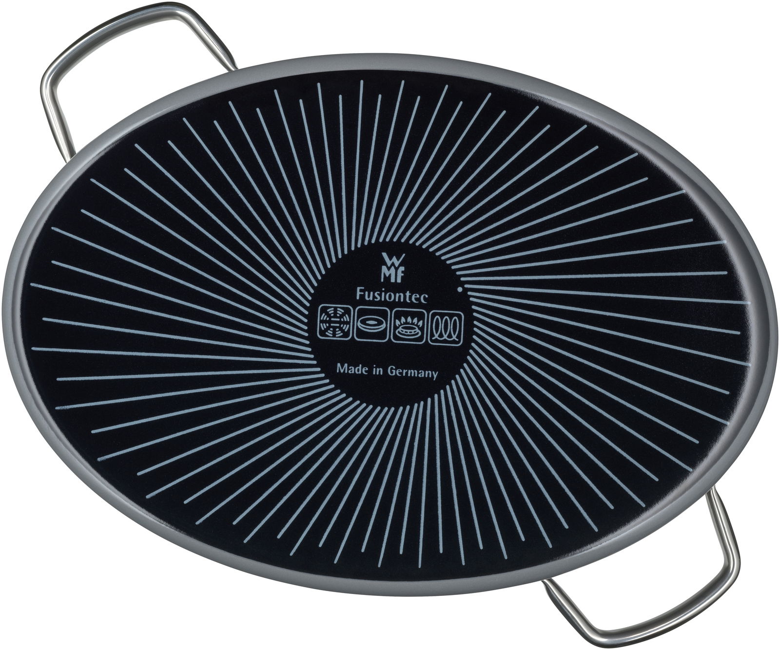 Ovale Mehrzweck-Bratform aus der Vogelperspektive mit zwei Griffen, schwarzer Boden mit strahlenförmigem Muster und WMF Fusiontec Logo, Made in Germany.