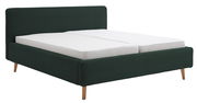 Polsterbettgestell in dunklem Grün mit Holzfüßen, seitliche Perspektive