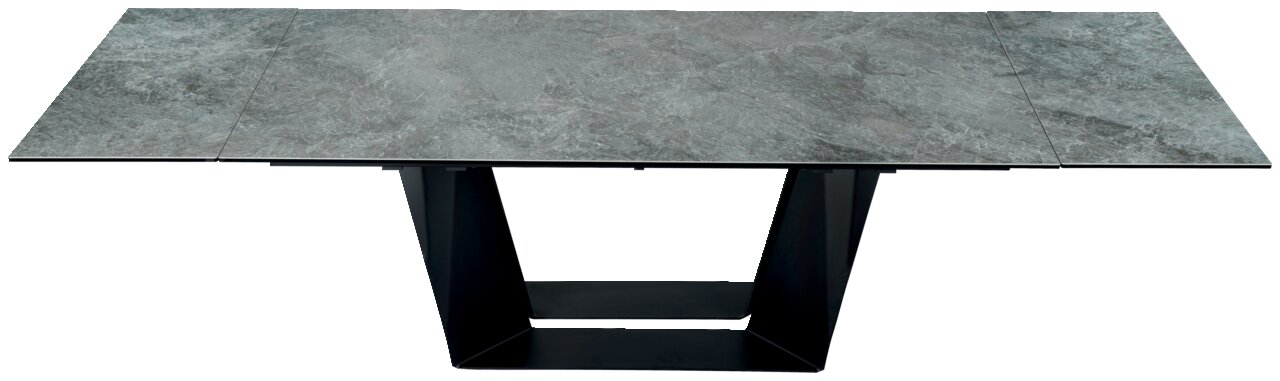 Moderner Esstisch mit grauer Steinoptik-Tischplatte und schwarzem Metallgestell, Ansicht von oben.
