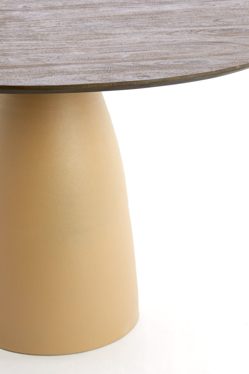 Close-up van een ronde eettafel met een houten blad en een conische, beige voet.