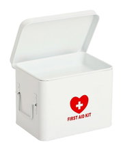 Weiße Medizinbox mit rotem Herz und Kreuz, Aufsicht mit geöffnetem Deckel