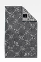 Graues Gästetuch mit elegantem Muster und JOOP!-Logo, von oben fotografiert.