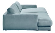 Seitenansicht eines kleinen Megasofas mit geripptem Stoff in hellblauer Farbe.