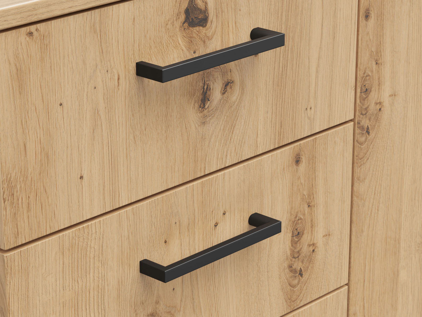 Nahaufnahme einer Kommode aus hellem Holz mit schwarzen Griffen, Perspektive von vorne.