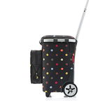 Seitenansicht eines schwarzen Carrycruisers mit bunten Punkten und Teleskopgriff.