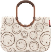 Zachte shopper-handtas van teddypluche in crèmekleur met bruin smileypatroon, ovale bruine handvatten en geribbelde handvatbekleding, vooraanzicht
