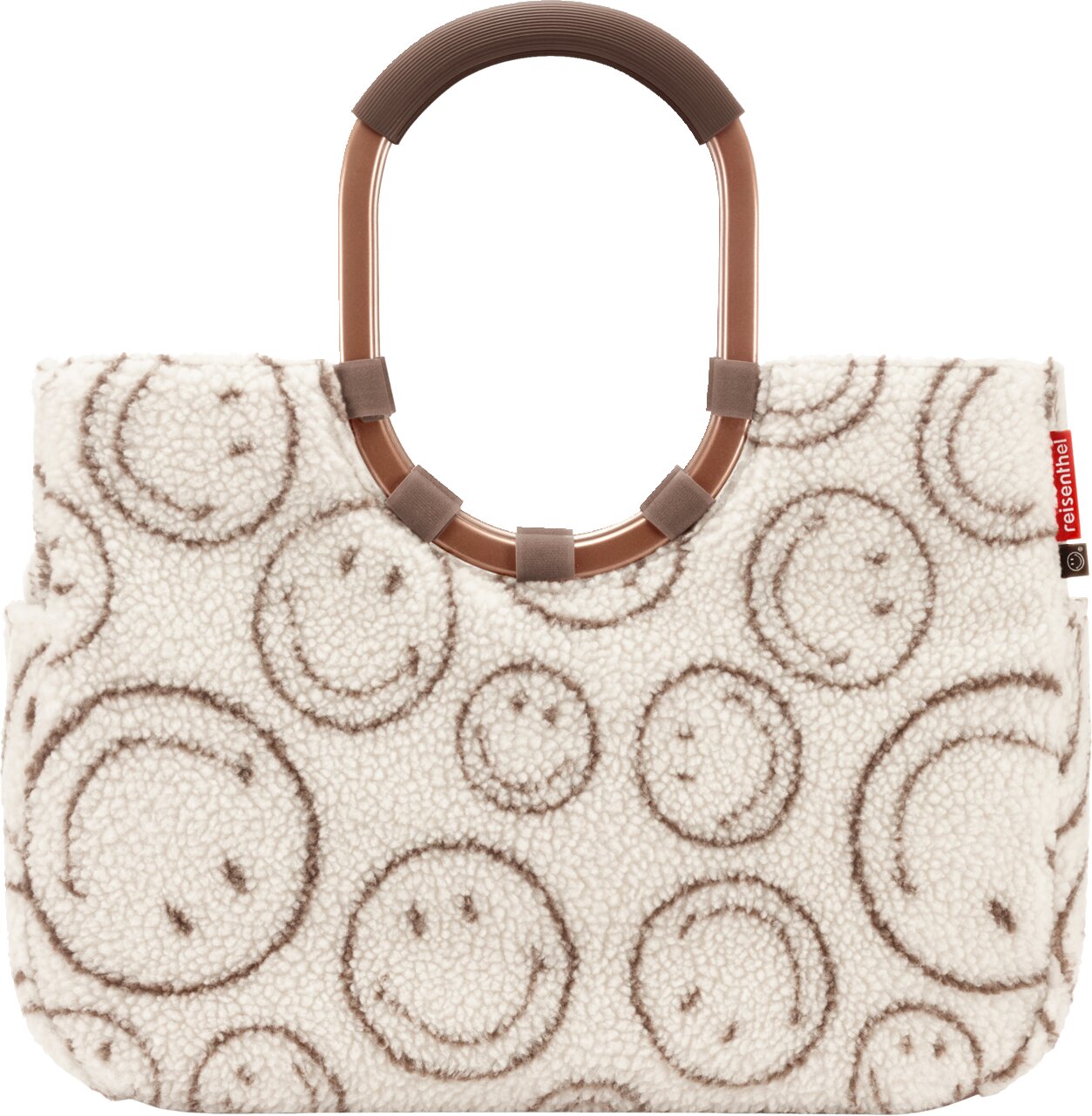 Zachte shopper-handtas van teddypluche in crèmekleur met bruin smileypatroon, ovale bruine handvatten en geribbelde handvatbekleding, vooraanzicht