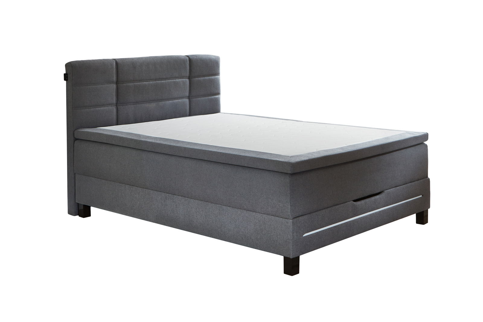 Graues Boxspringbett mit gepolstertem Kopfteil, seitlicher Perspektive