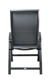 Rückansicht eines schwarzen Klappsessels Stern KARI mit Metallrahmen und Netzbespannung.