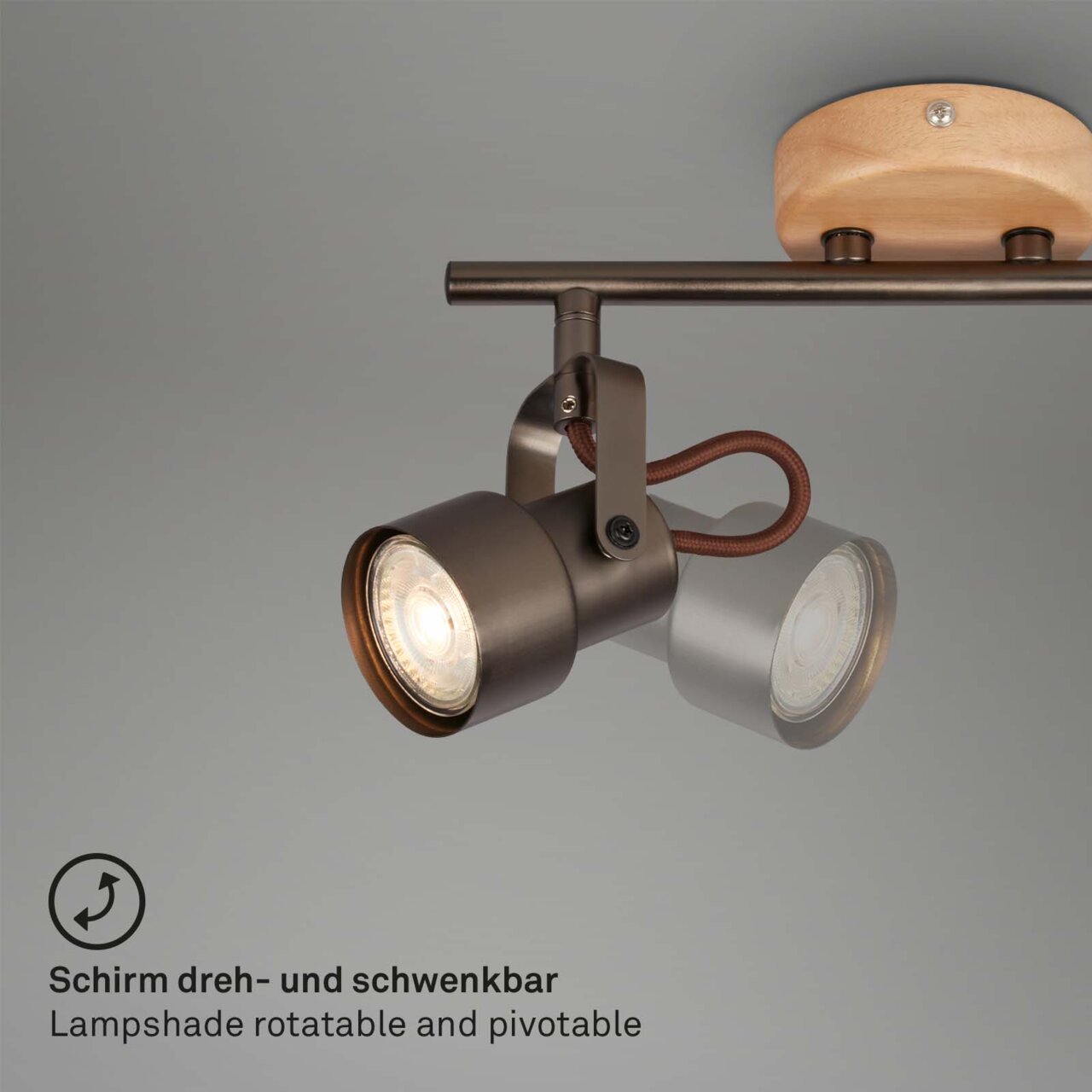 Spotleuchte mit dreh- und schwenkbarem Schirm, seitliche Perspektive