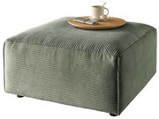 Grüner, gerippter Hocker aus Stoff in seitlicher Perspektive mit einem Tablett, einer Tasse und Pralinen darauf.