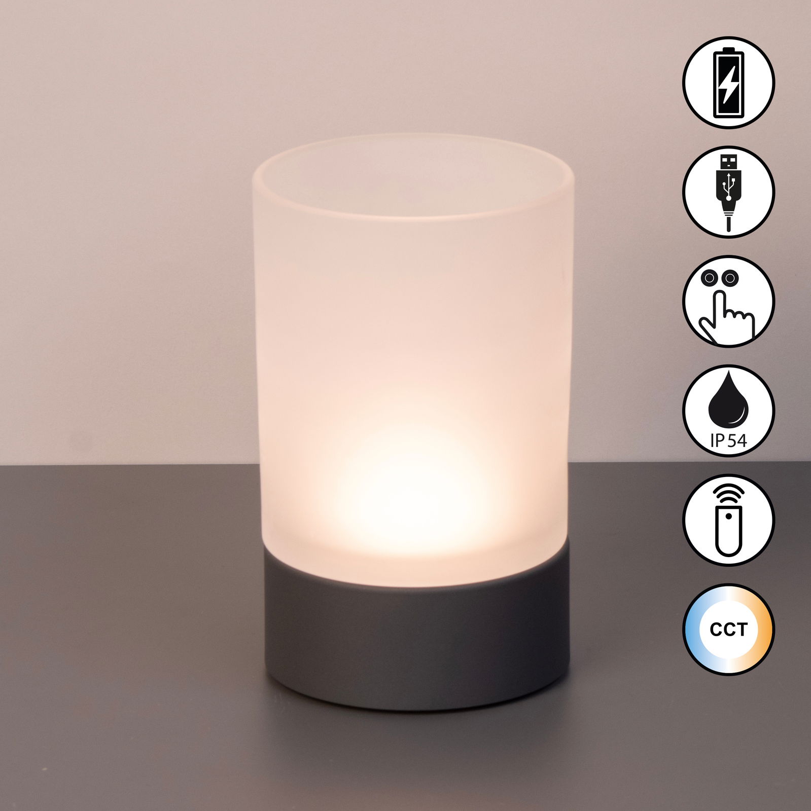 Zylindrisches Akku-Windlicht mit mattem Glas und dunklem Sockel, frontal fotografiert. Symbole für USB-Ladung, Touch-Bedienung, IP54-Schutz, Fernbedienung und CCT-Farbtemperaturwechsel sind sichtbar.