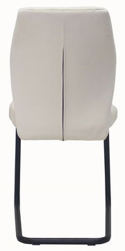 Rückansicht eines modernen Schwingstuhls mit schwarzem Metallgestell und beigem Polster.