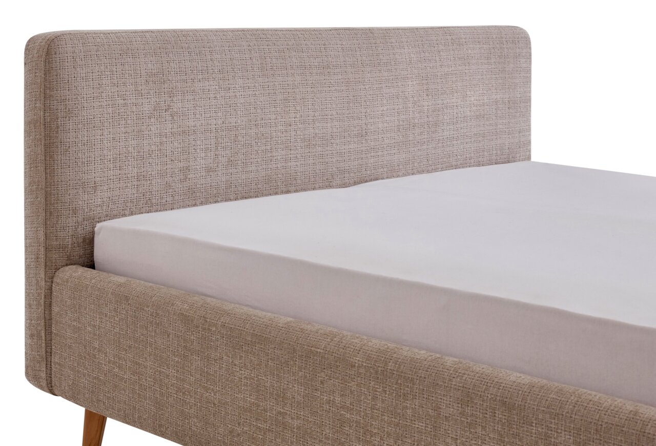 Polsterbettgestell in beige mit Stoffbezug, seitliche Perspektive