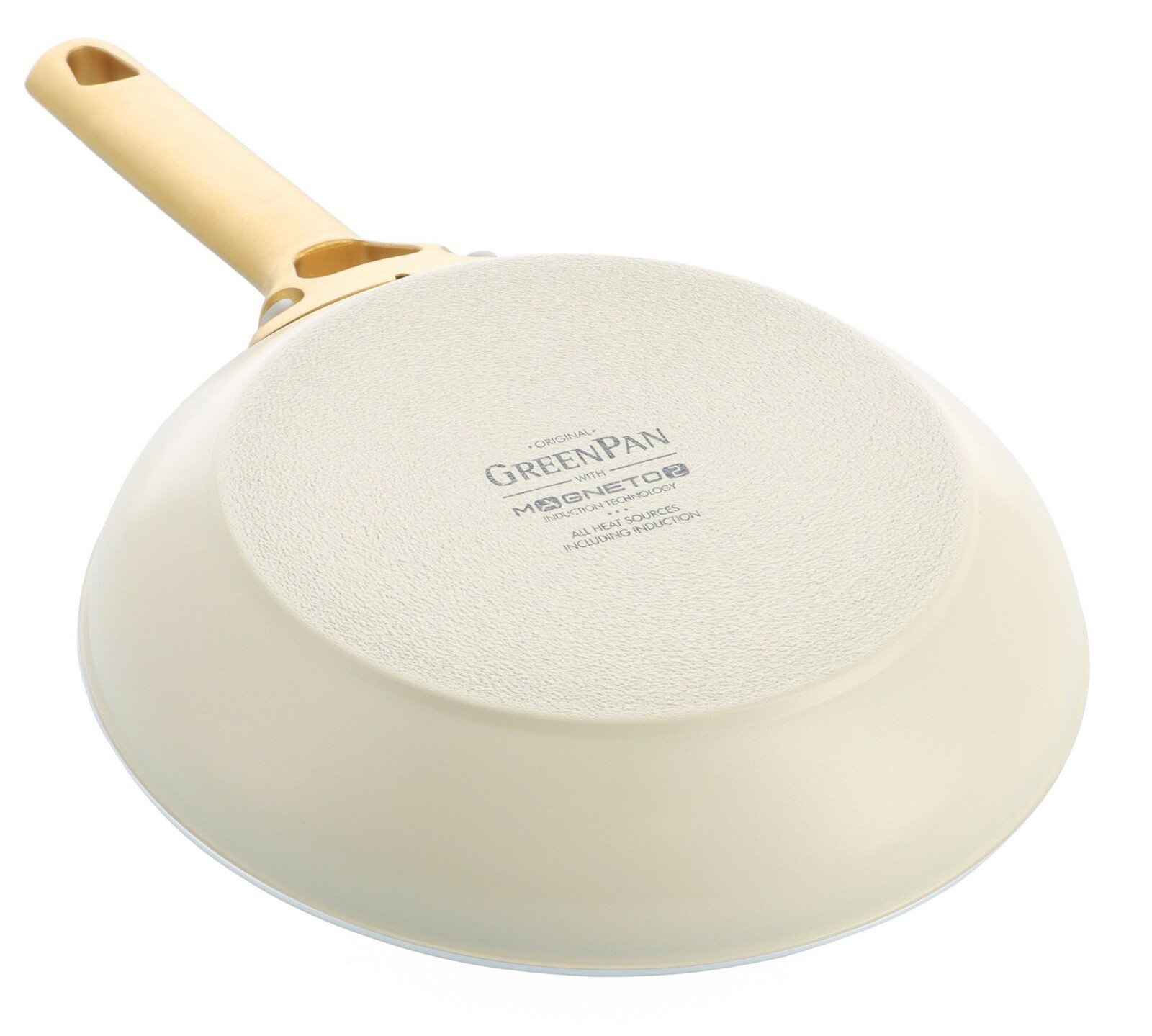 Unteransicht einer Pfanne mit beigem Griff und Magneto-Technologie, geeignet für alle Herdarten inklusive Induktion.