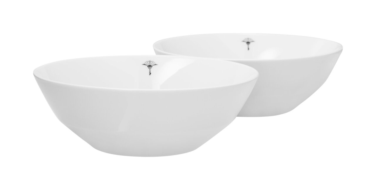 Zwei weiße Schalen mit schwarzem Muster, seitliche Perspektive