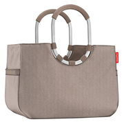 Beige Einkaufstasche mit stabilen, runden Griffen aus Metall und Stoff, seitliche Ansicht.