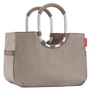 Beige Einkaufstasche mit stabilen, runden Griffen aus Metall und Stoff, seitliche Ansicht.