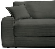 Großes, modernes Big-Sofa in dunklem Stoff mit geripptem Design, seitliche Perspektive