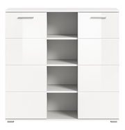 Weiße Kommode mit mehreren Schubladen und offenen Fächern, frontale Ansicht