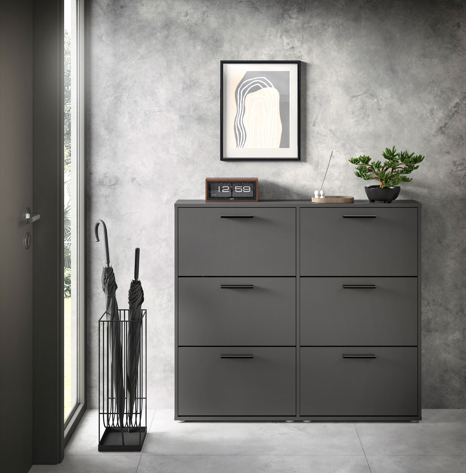 Schuhkipper 6er in modernem, grauem Design, frontal fotografiert, mit dekorativen Elementen wie einer Uhr und einer Pflanze darauf.