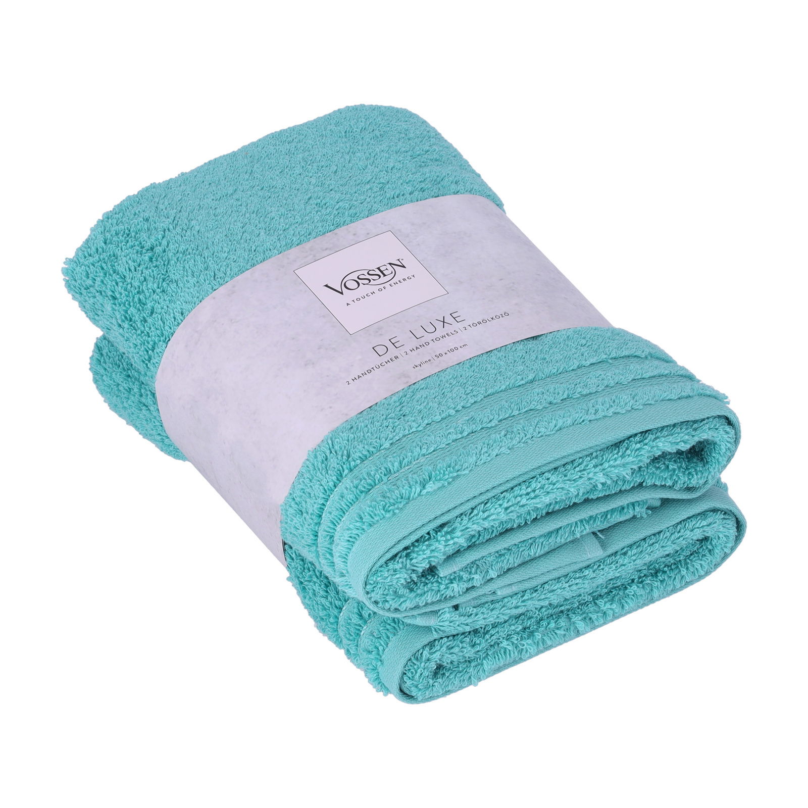 Zwei türkisfarbene Handtücher der Marke Vossen, Modell De Luxe, aufgerollt und von schräg oben fotografiert.