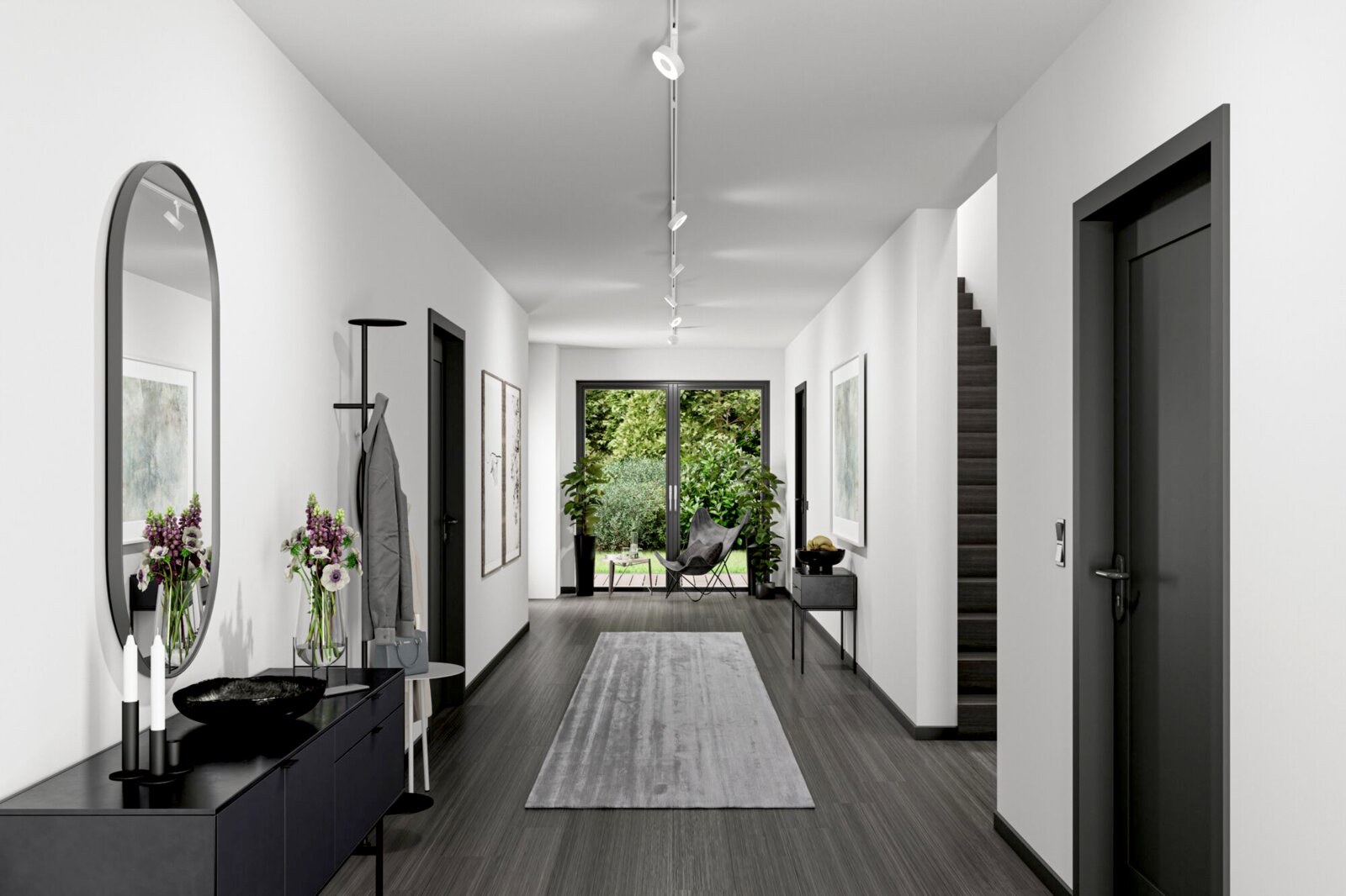 Moderner Flur mit Schienenspot Circle an der Decke, Blick in Richtung Garten.