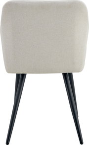 Beiger, gepolsterter Stuhl mit Stoffbezug und schwarzen, schräg stehenden Metallbeinen, Rückansicht vor weißem Hintergrund